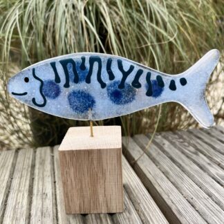 Fish on wooden stand