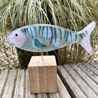 Fish on wooden stand