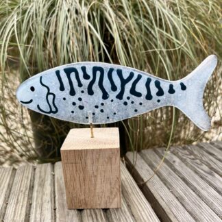 Fish on wooden stand