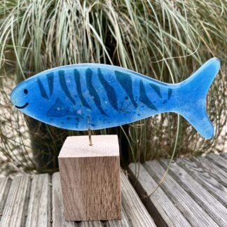 Fish on wooden stand