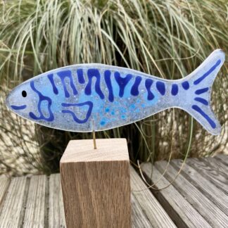 Fish on wooden stand